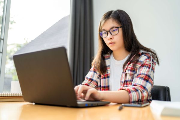 young asian female student working studying with remote learning from home city lockdown 11zon