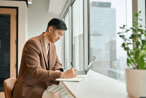 young busy asian business man 600nw 2309392033